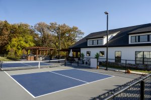 Clubhouse and pickleball courts at The Residences at Maren Reserve